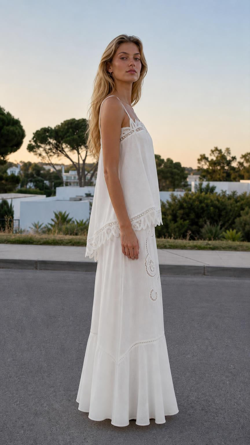 Side profile of woman in white two-piece matching set