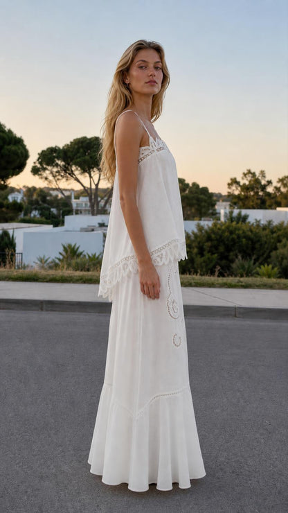 Side profile of woman in white two-piece matching set