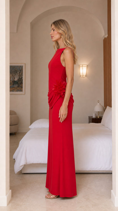 Side profile of model in red formal maxi dress