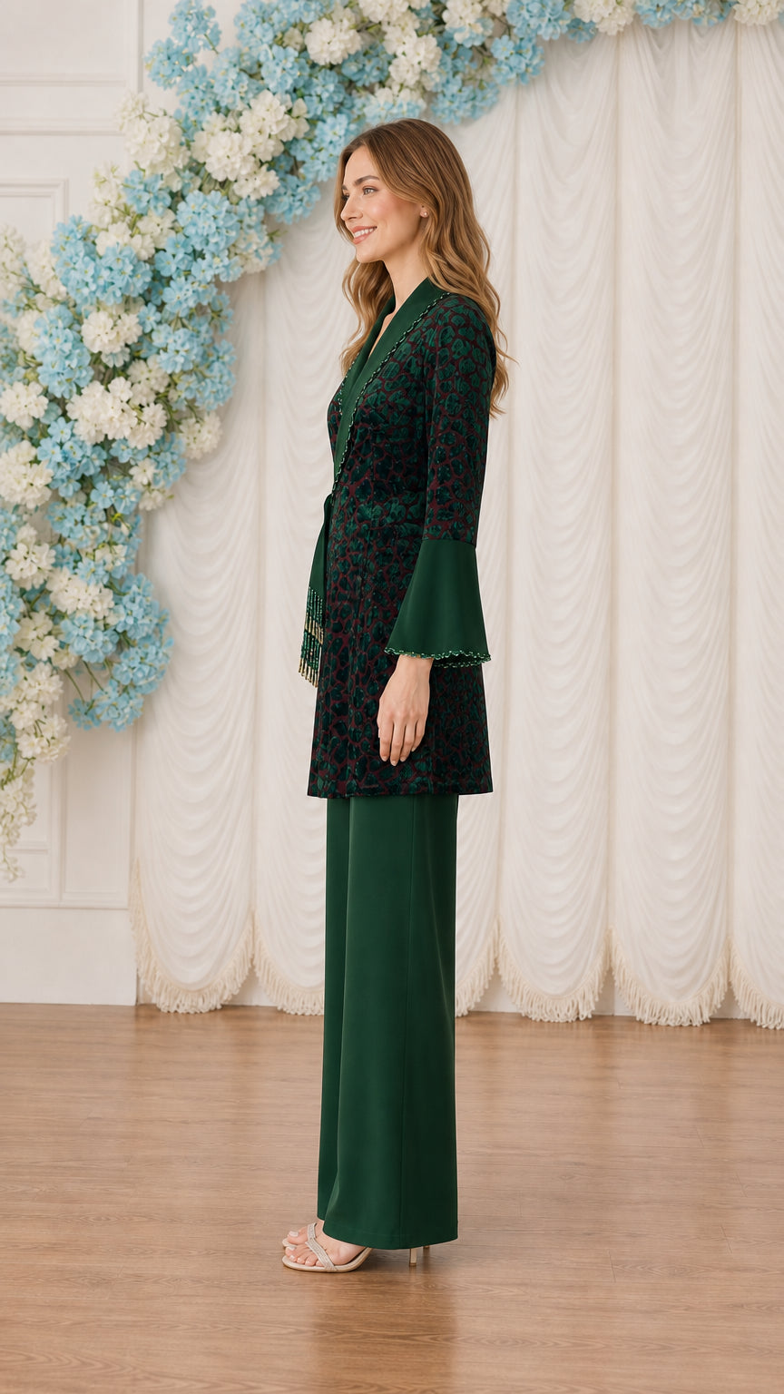 Side profile view of model in Dark Green long sleeve wrap tunic pant set