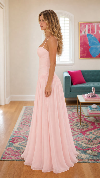 Side view of pink chiffon corset maxi dress