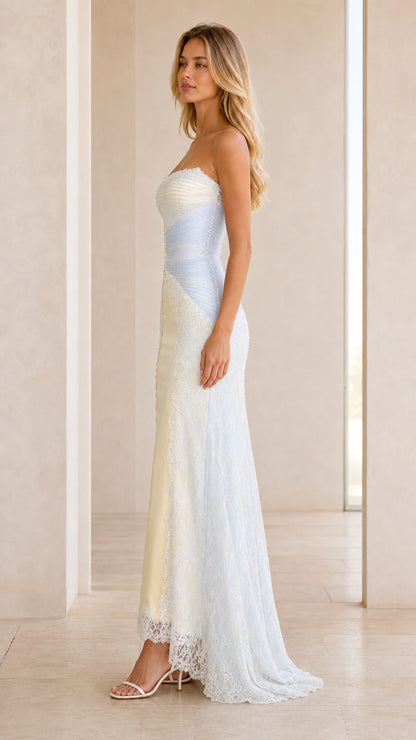 Side profile view of light blue and yellow strapless formal maxi gown