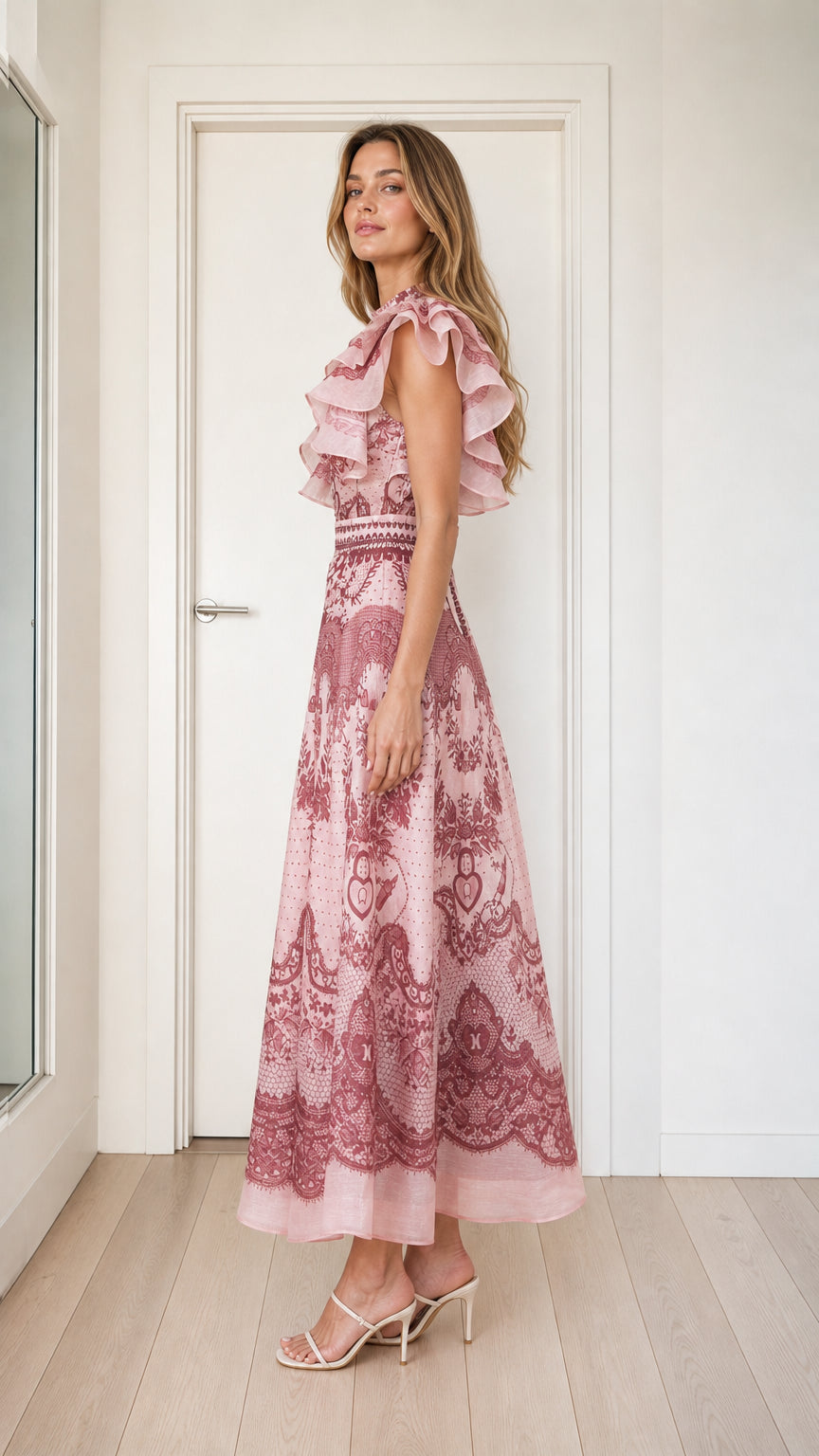 Pink ruffled midi dress side profile view