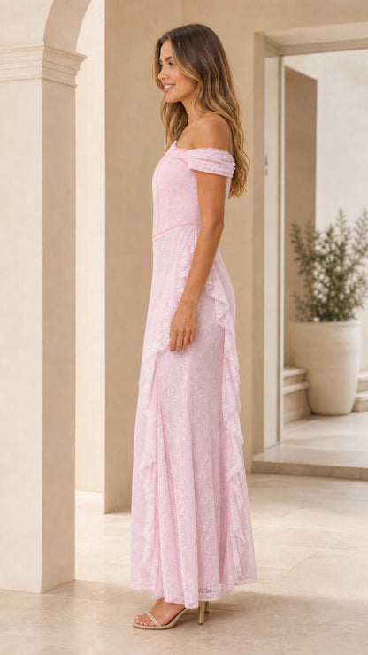 Side profile view of pink lace maxi dress