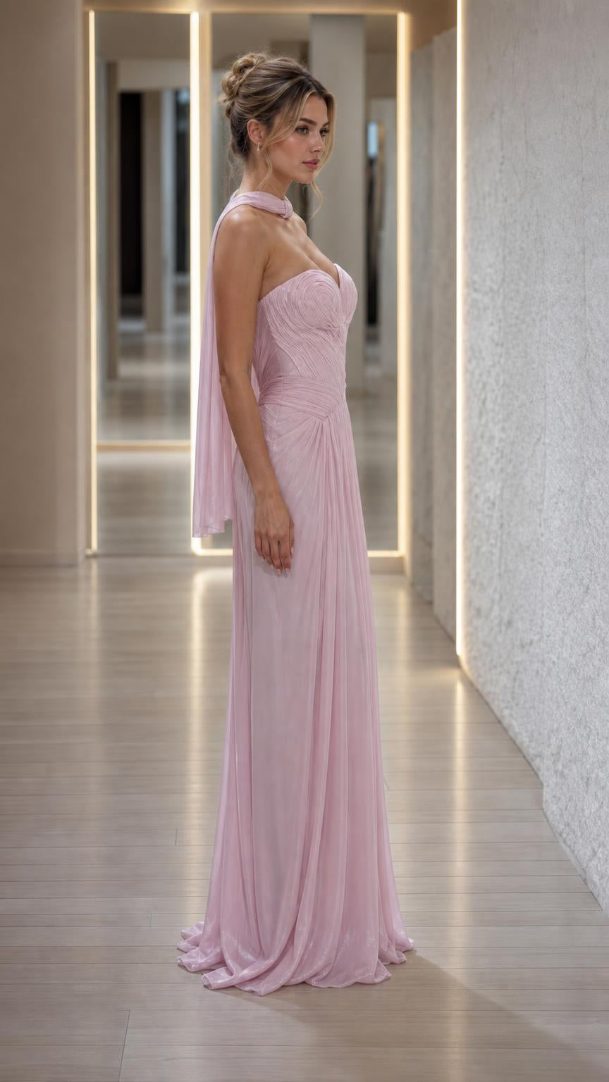 Side view of pink pleated evening dress