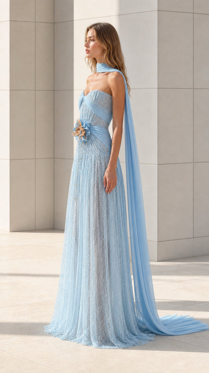 Side profile of light blue evening gown showing flow and silhouette
