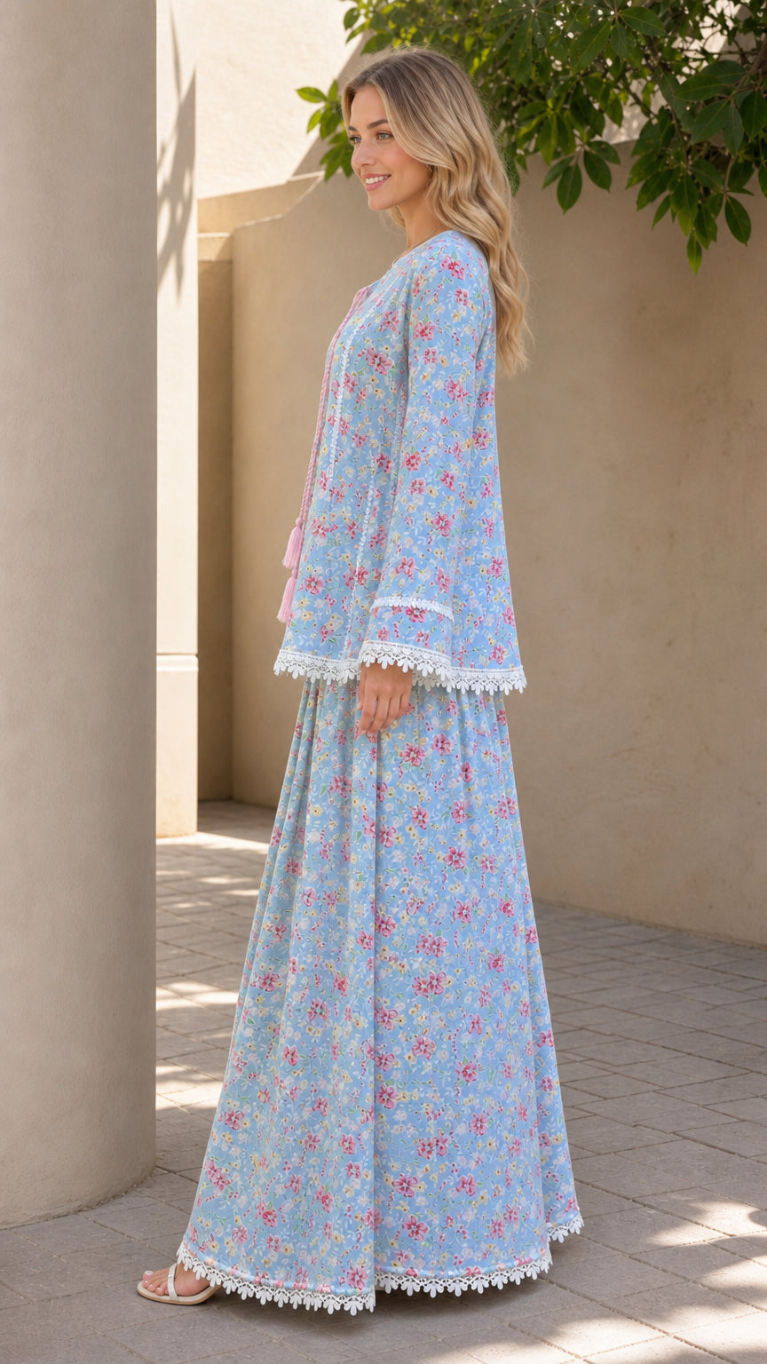 Side profile of model in light blue floral two-piece set