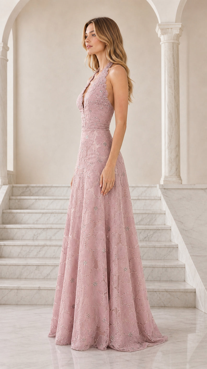 Side-front view of dusty pink floor-length halter formal dress