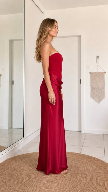 Burgundy strapless floor-length dress shown from the side