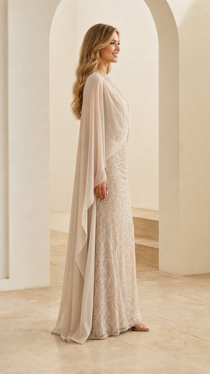 Side profile view of champagne sequined evening gown with floor-length chiffon drape