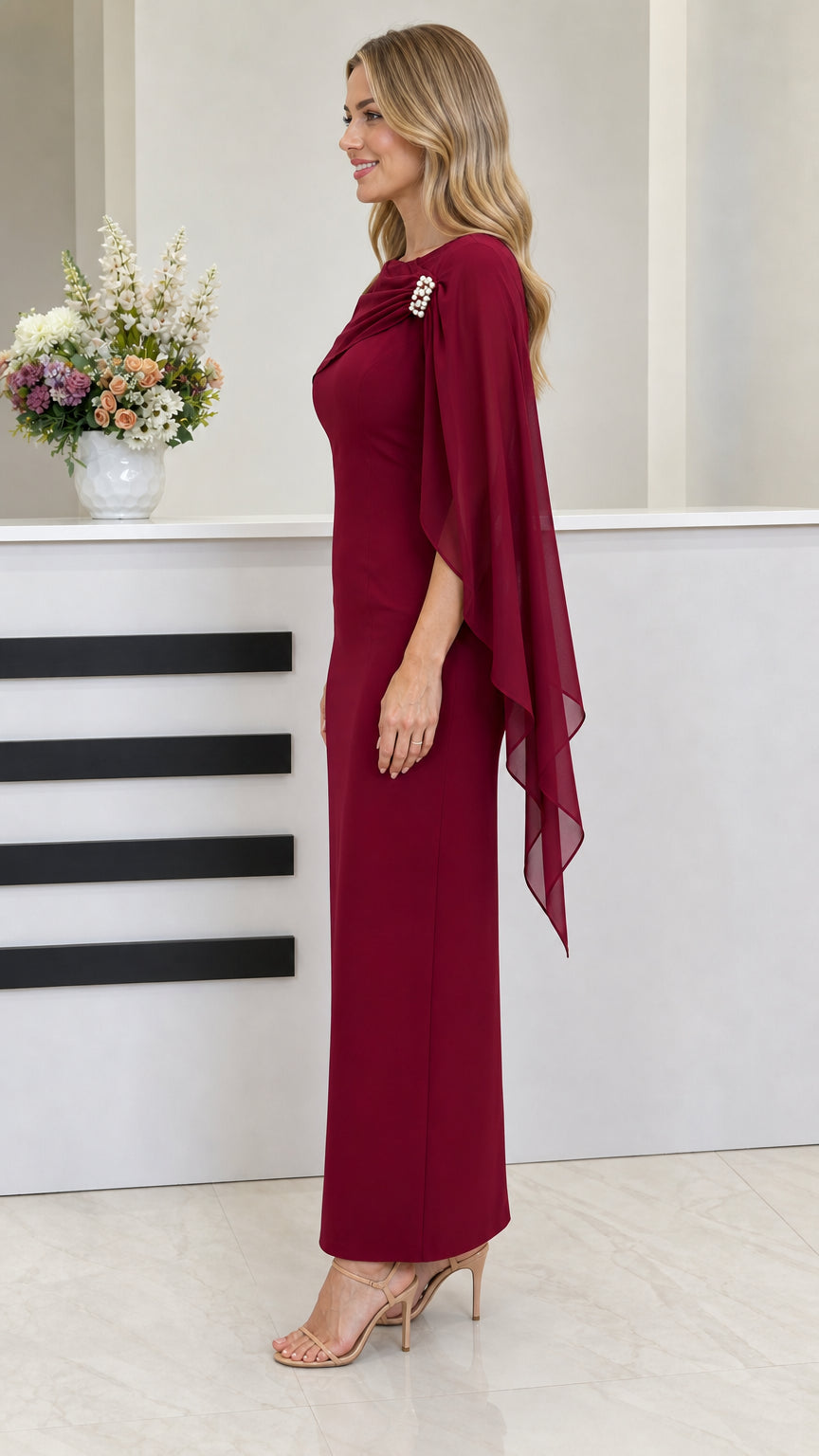 Side profile view of burgundy evening dress