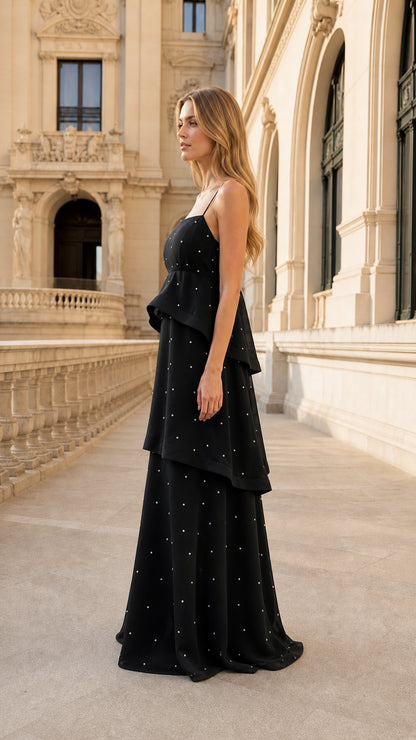 Side profile view of black evening gown