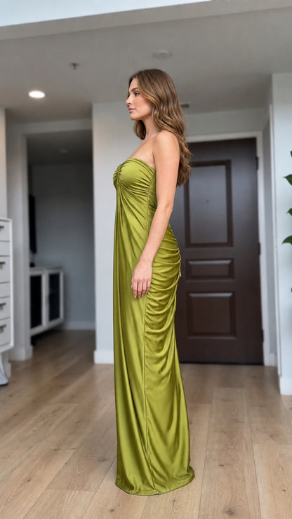 Side profile view of olive green maxi dress