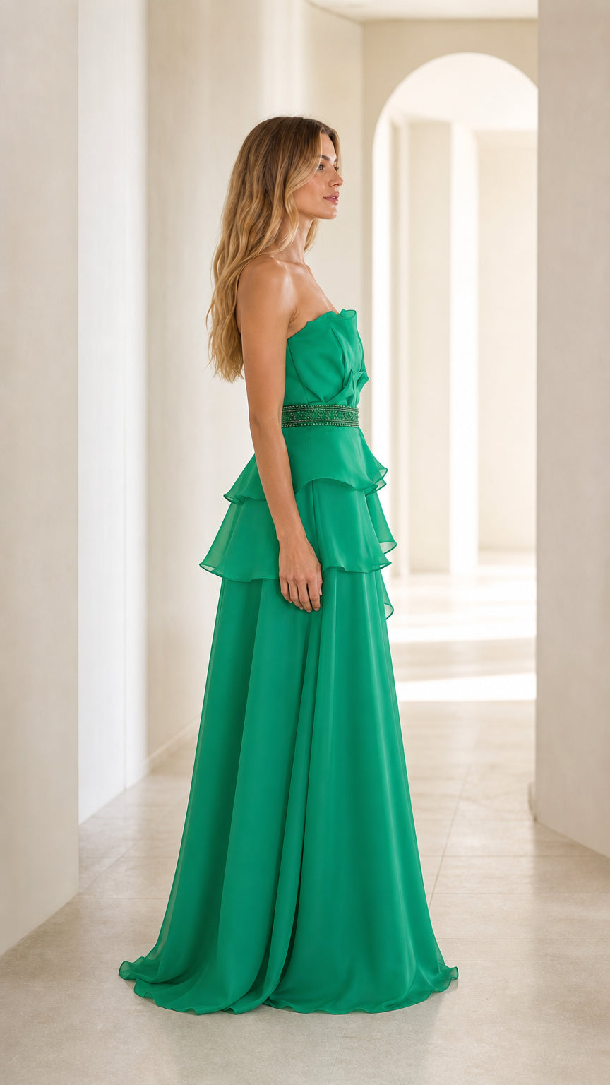 Side profile of green strapless evening gown