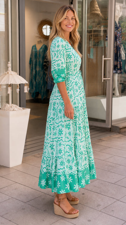Side profile of mint green maxi dress