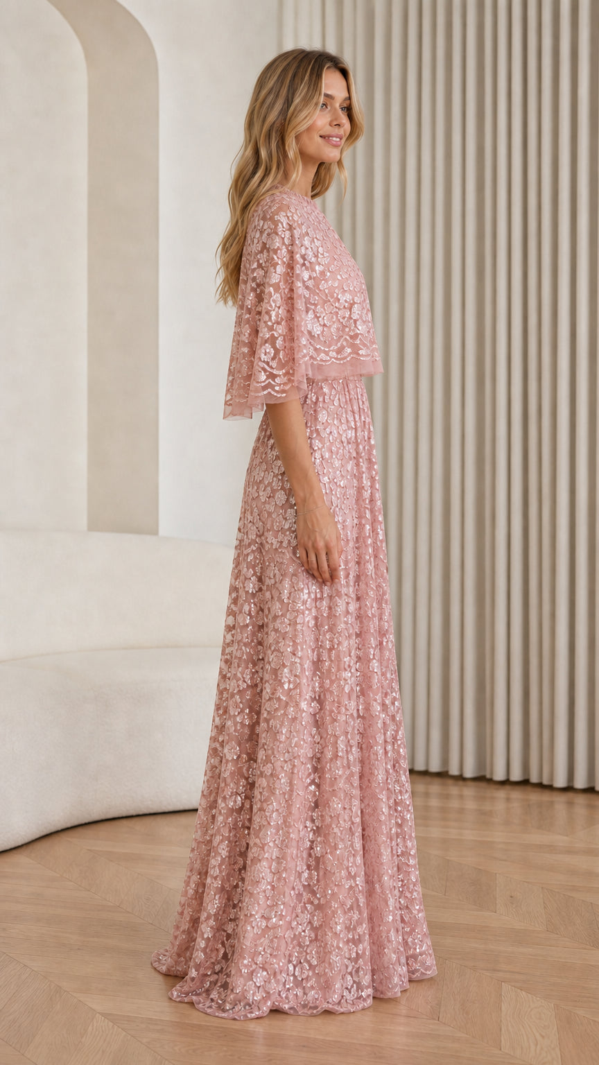 Side profile view of Dusty Rose sequin cape maxi dress