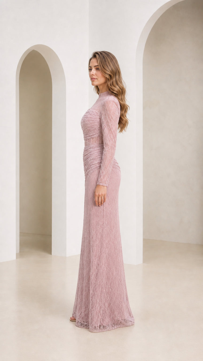 Side profile of model in dusty rose lace maxi dress