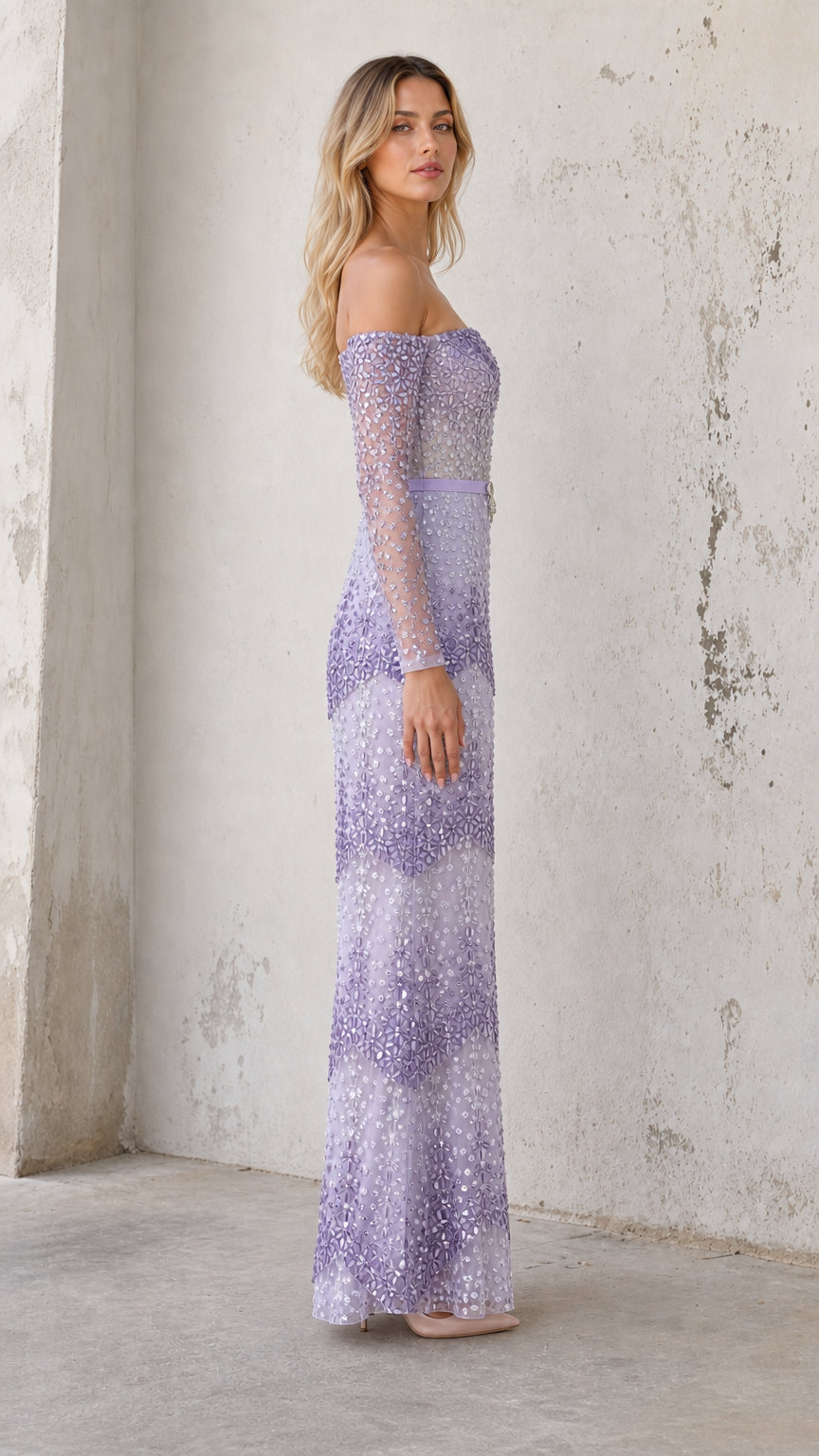 Model wearing lavender embellished gown, side profile view