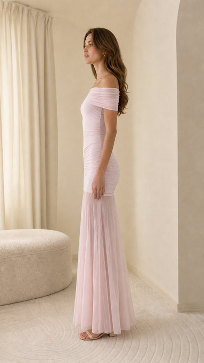Side profile view of light pink maxi dress