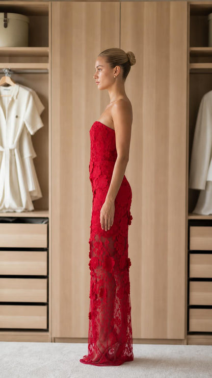 Side profile of red strapless floral applique maxi dress