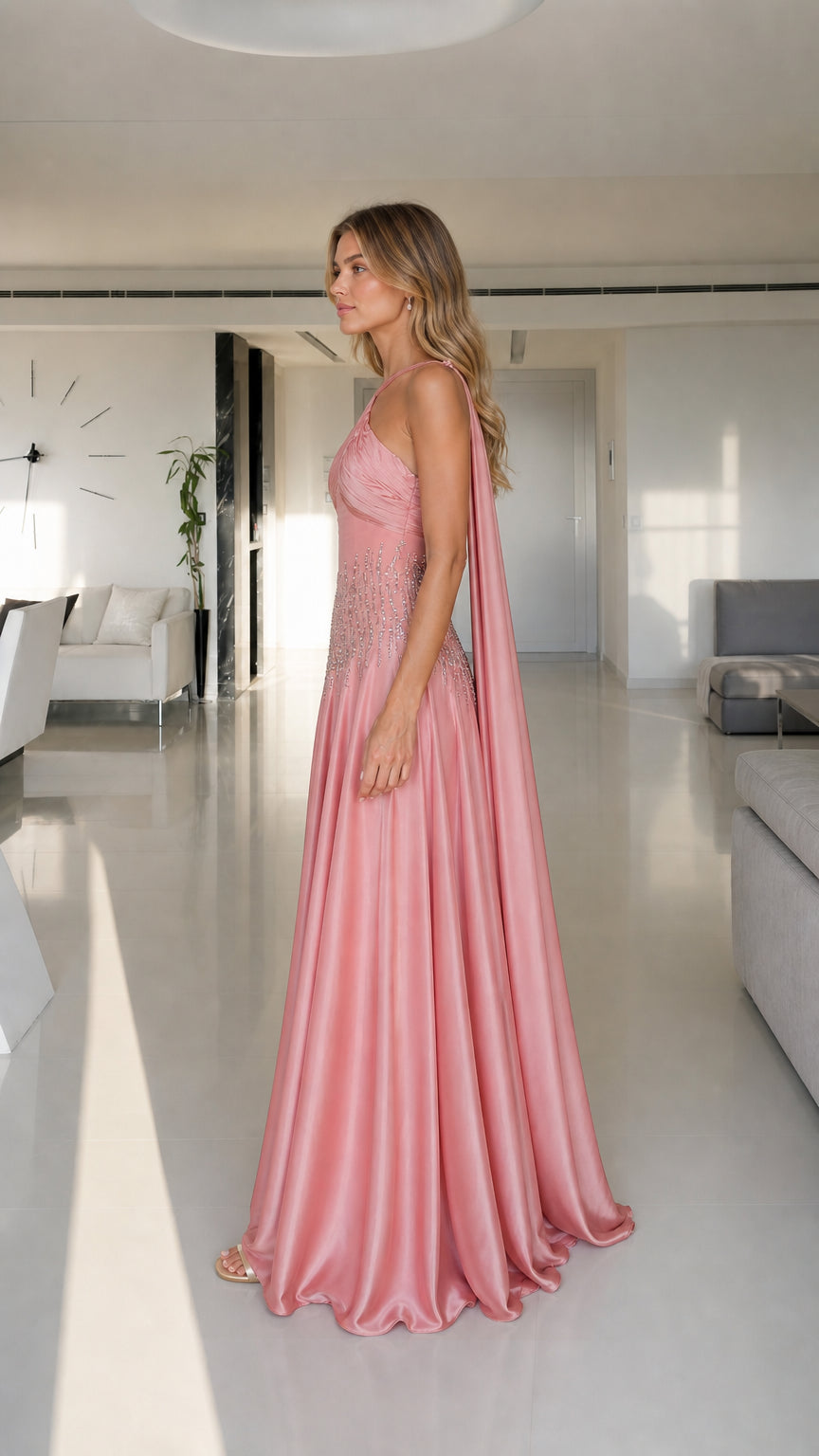 Model wearing pink satin maxi dress side view