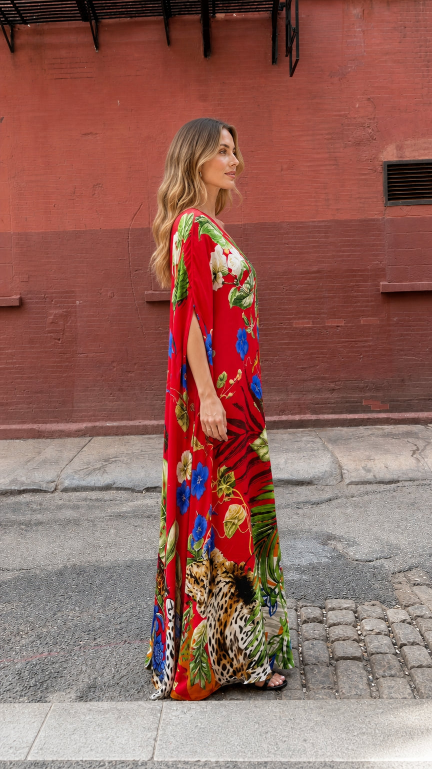 Side profile view of red tropical print maxi dress