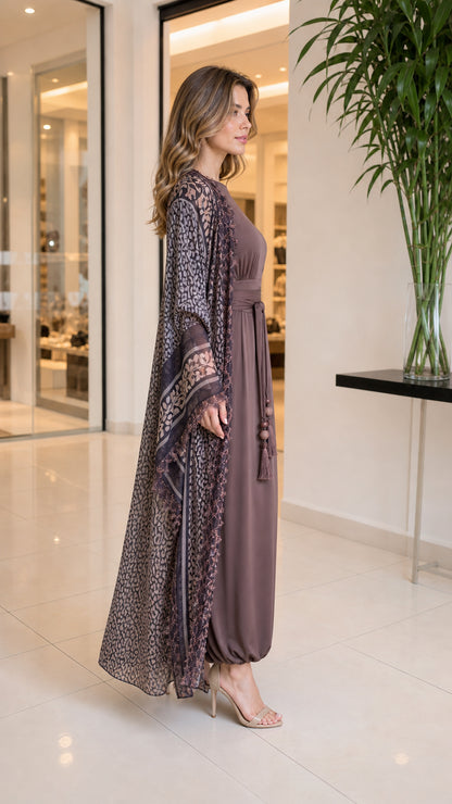 Side profile view of mocha brown jumpsuit and duster set with tassel tie belt