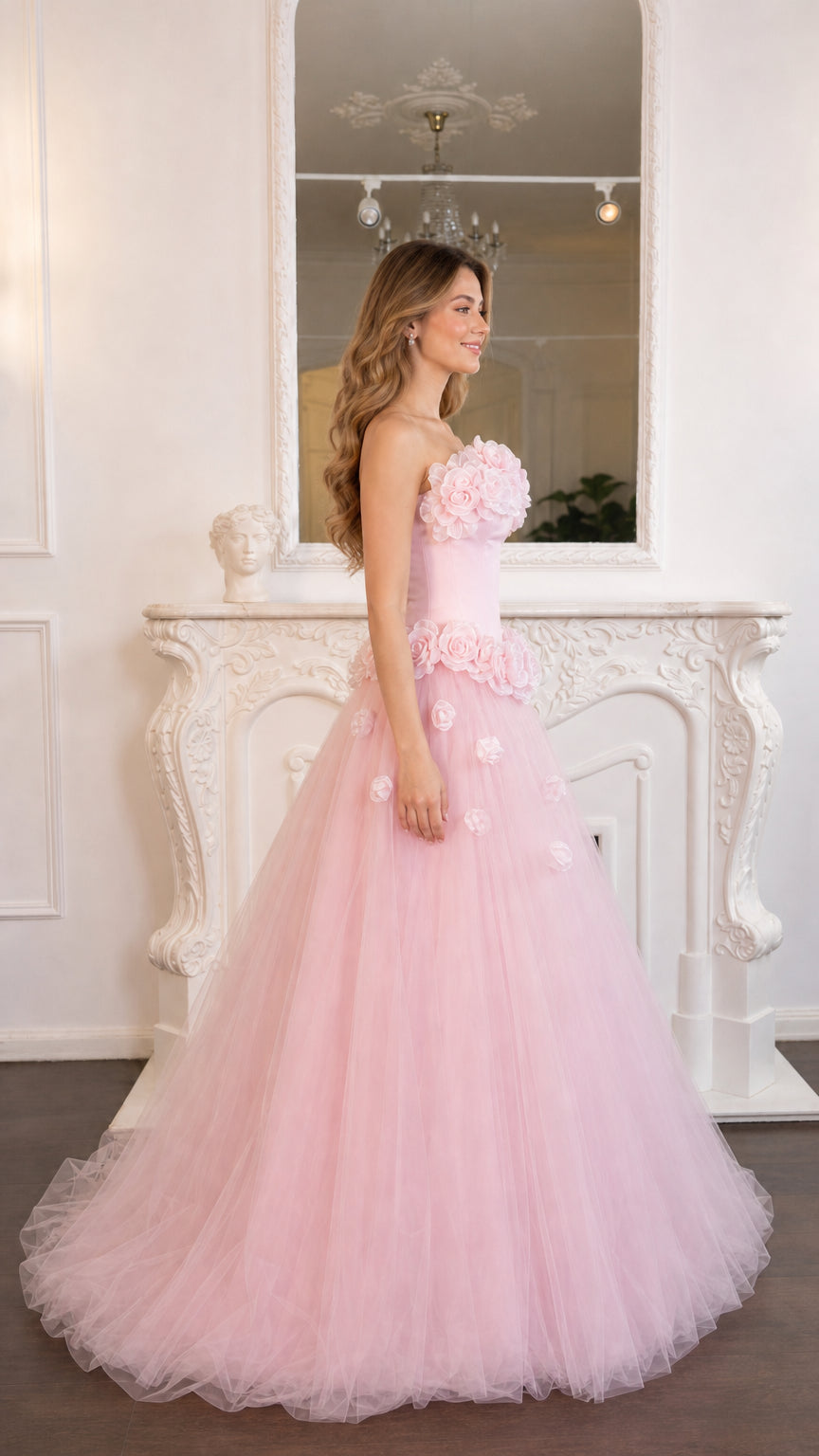 Side profile view of model in the pink floral formal gown