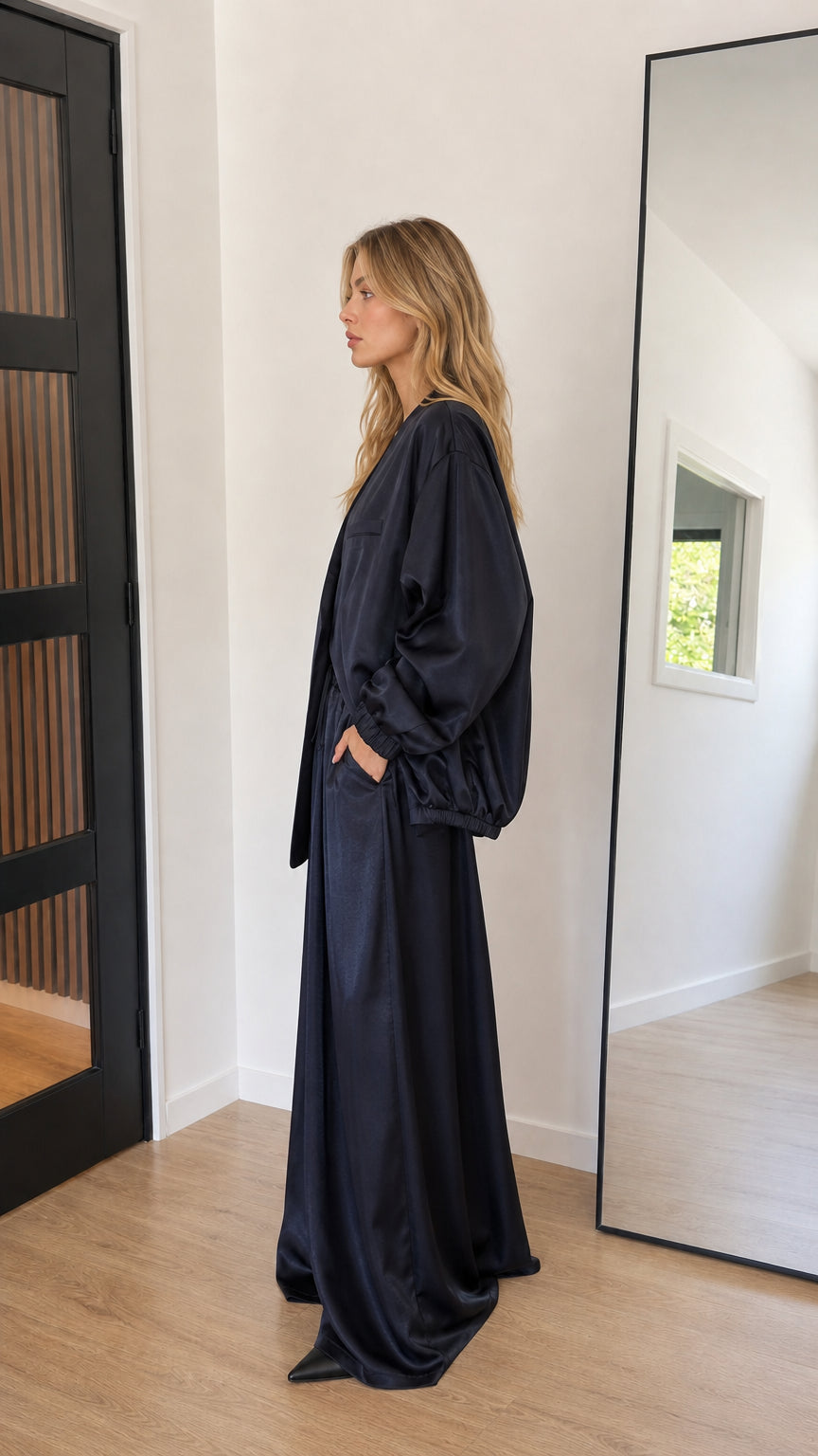 Navy blue satin two-piece pant set side angle view