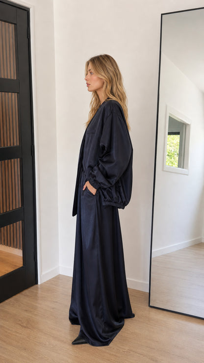 Navy blue satin two-piece pant set side angle view