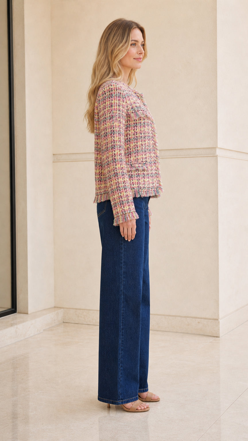 Model wearing multi pink tweed jacket side view