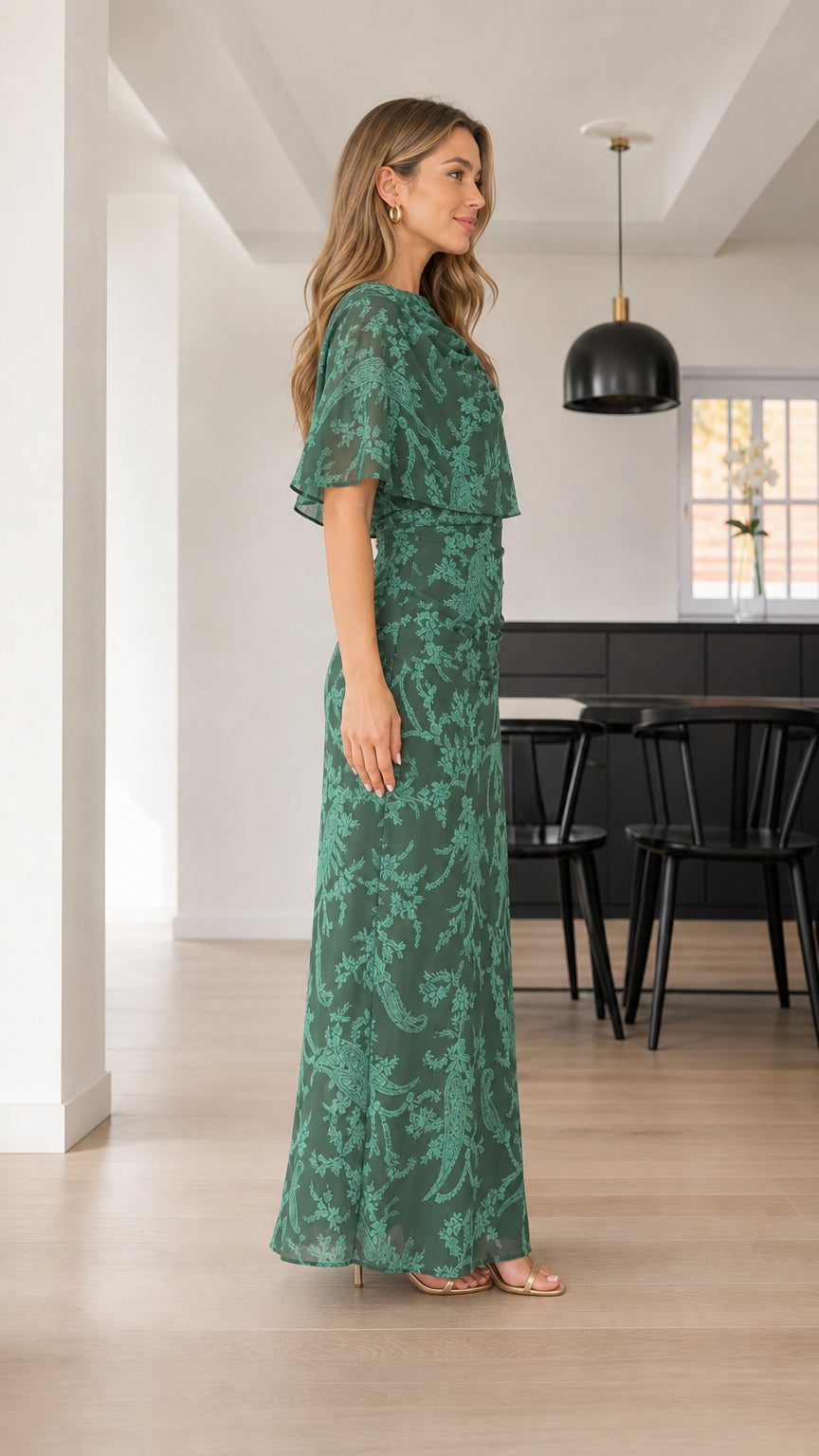 Side view of Forest Green capelet maxi dress showing silhouette and length