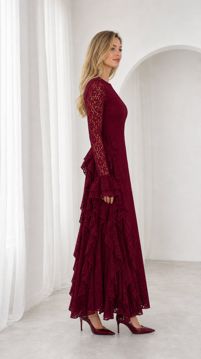 Side profile view of burgundy lace maxi dress showcasing vertical ruffled accents