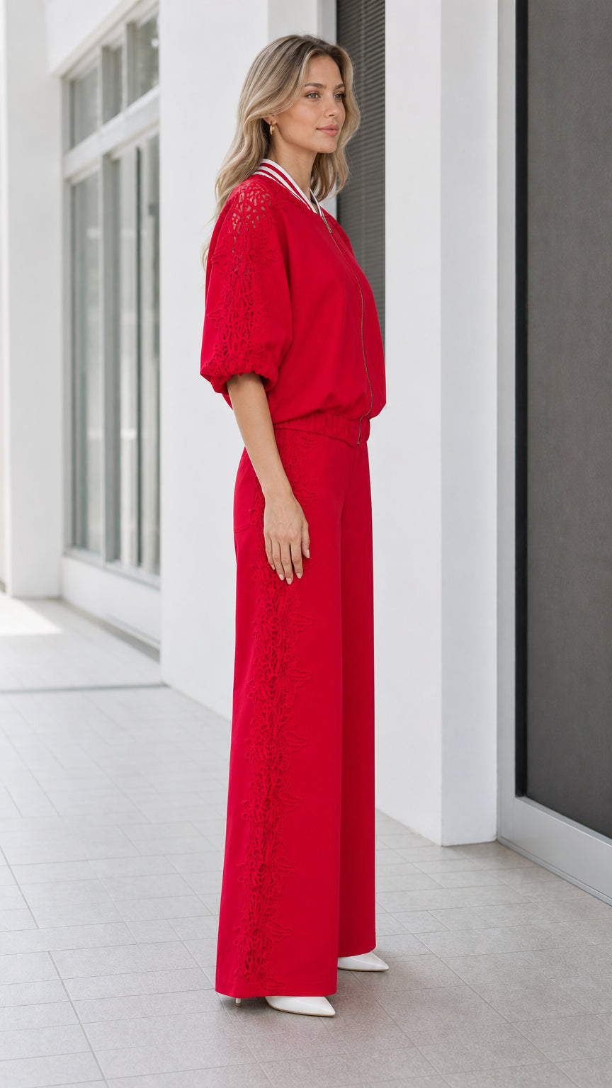 Side profile of women's red lace trim two-piece matching set