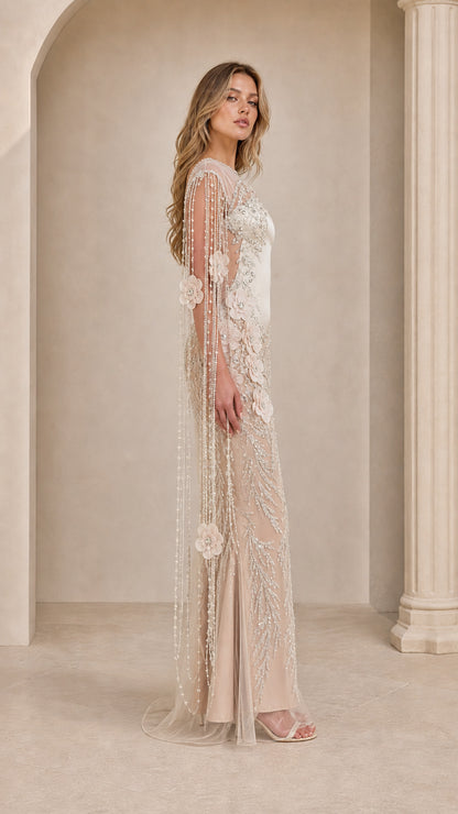Side view of champagne beaded cape sleeve formal maxi dress