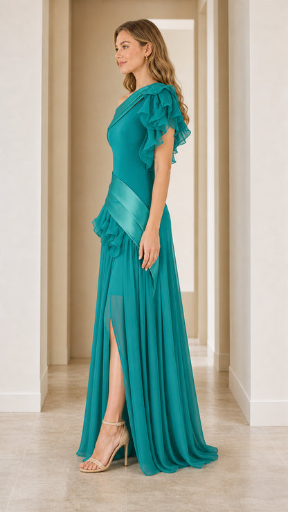 Model wearing teal evening gown side view showing slit