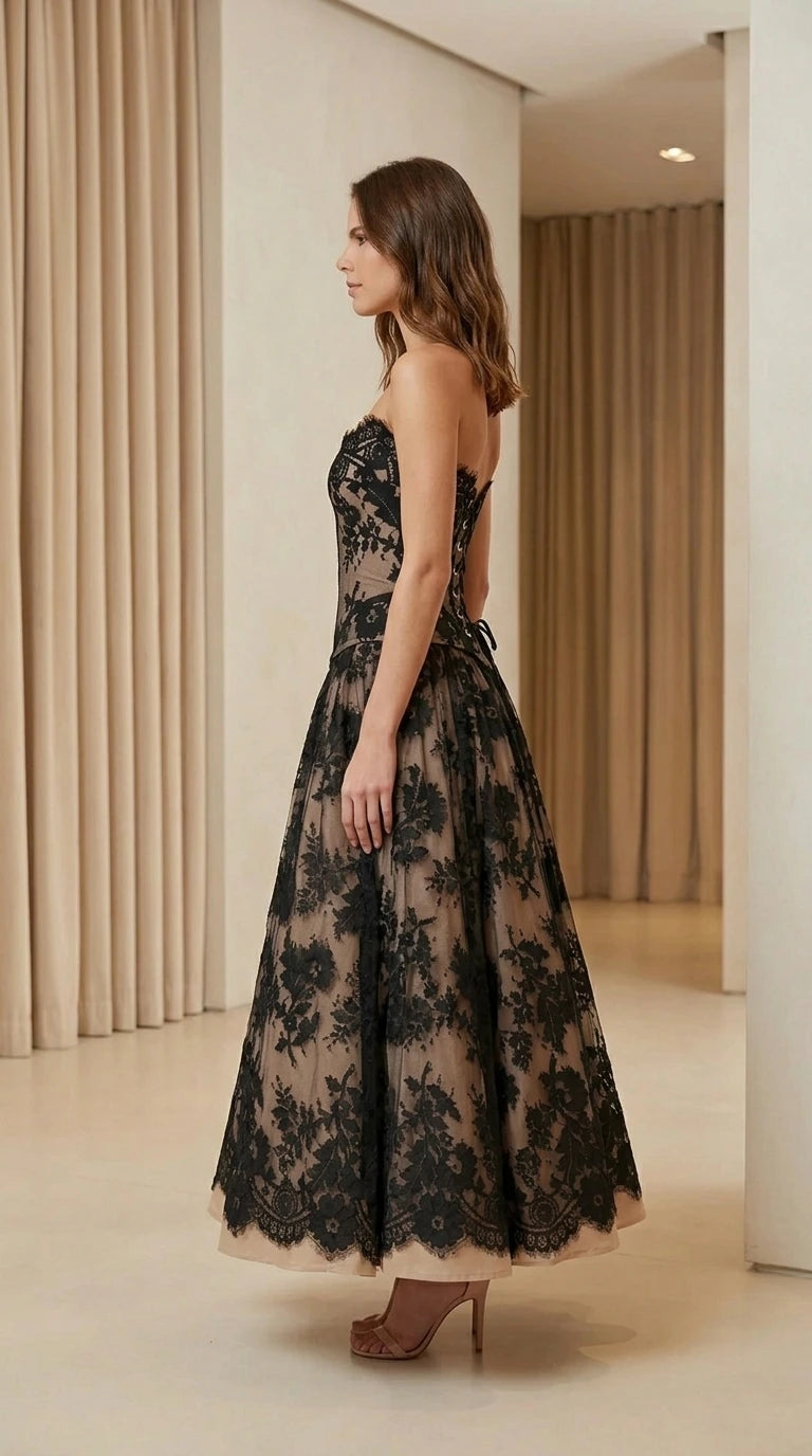 Model wearing strapless lace corset midi dress side view