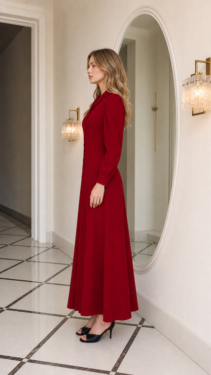 Side profile view of burgundy long sleeve maxi dress