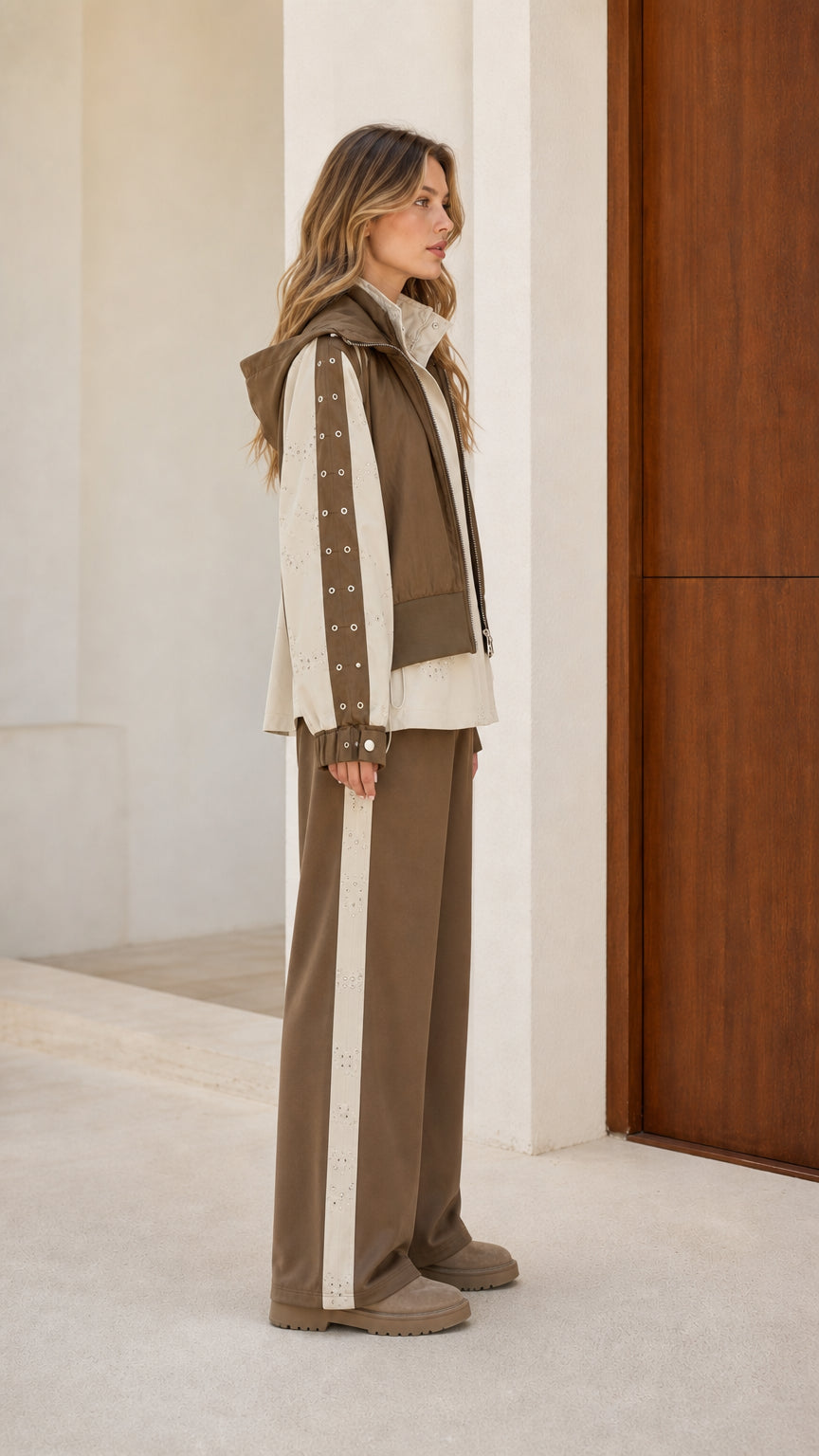 Side profile view of model wearing Khaki Contrast hooded utility jacket