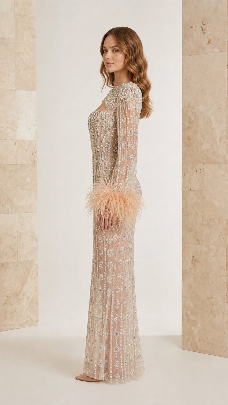 Champagne beaded formal maxi dress with feather cuffs side profile view