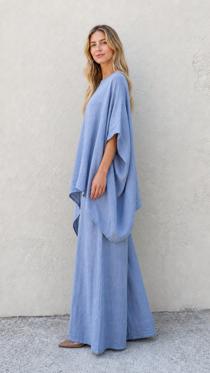 Side profile of woman in blue two-piece wide leg pant set
