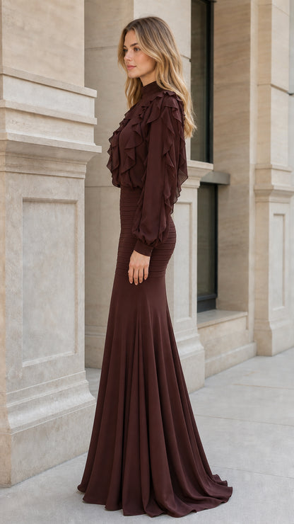 Side profile view of woman in brown ruffled maxi dress