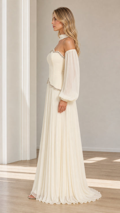 Side profile view of ivory beaded scalloped maxi evening dress with pleated lantern sleeves