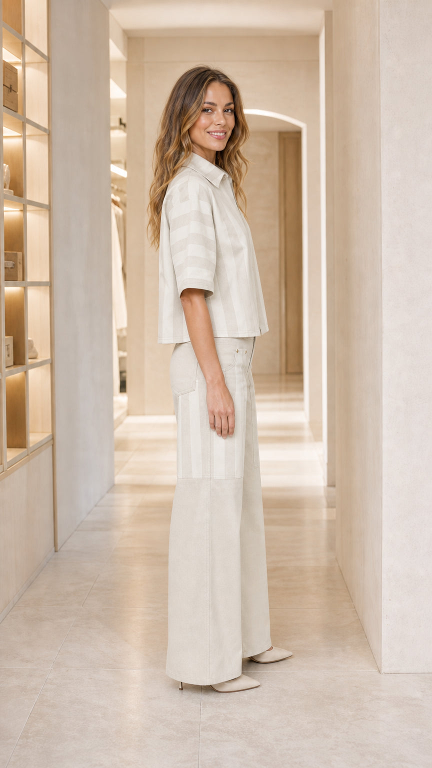 Side view of woman wearing beige matching set