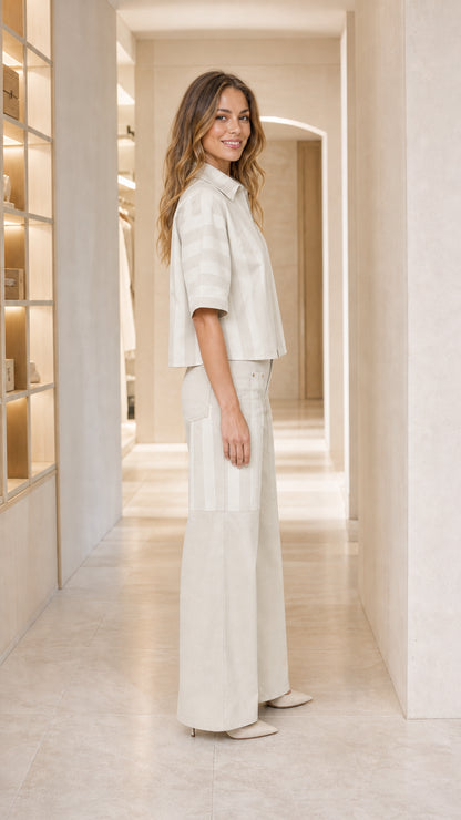 Side view of woman wearing beige matching set