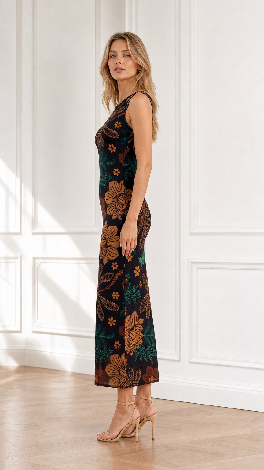 Side profile of model wearing black botanical floral print midi dress