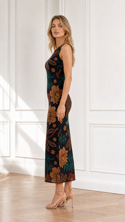 Side profile of model wearing black botanical floral print midi dress