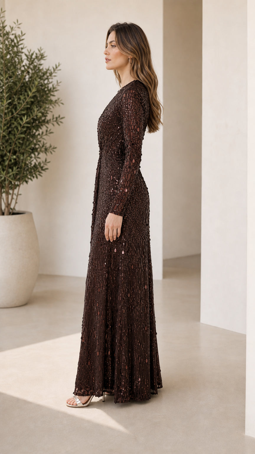 Side profile view of brown sequin evening gown