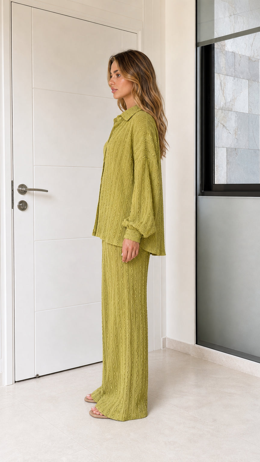 Side view of woman wearing olive green textured two-piece lounge set