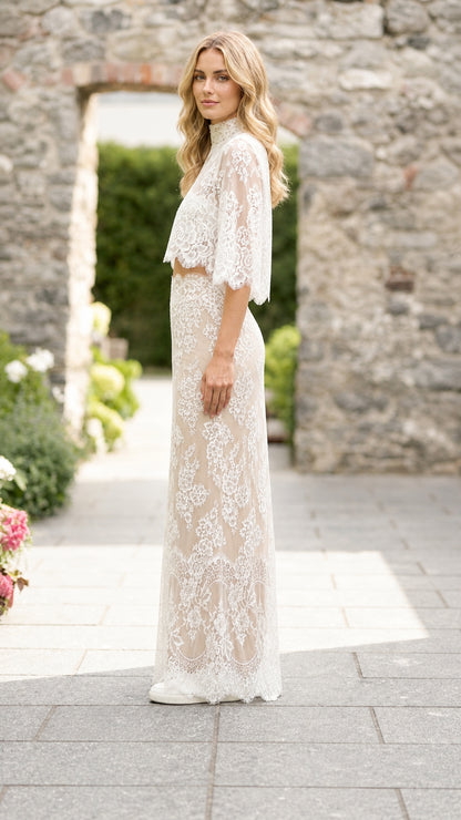 Side profile of woman in white lace two-piece set
